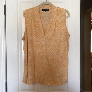 ALL SLEEVELESS TOPS 3 FOR $25